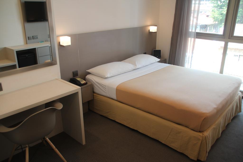 Classique Hotel Singapore Room photo