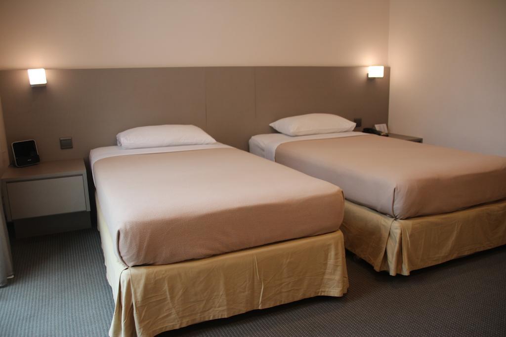 Classique Hotel Singapore Room photo